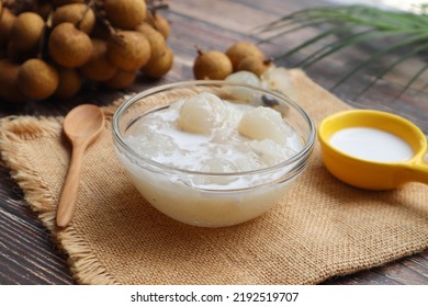 Sticky rice boiled in syrup with longan and coconut milk dressing at close up view - Thai dessert called Kao Nioew Piak LamYai - Shutterstock ID 2192519707