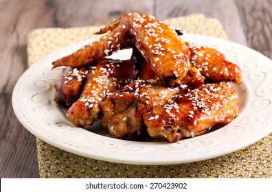 Sticky Sesame Chicken Wings In A Plate