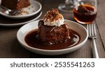 Sticky Toffee Pudding - Moist sponge cake soaked in rich toffee sauce.