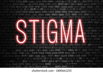 Stigma Glowing Neon Word On Black Brick Wall. Tolerance Concept.