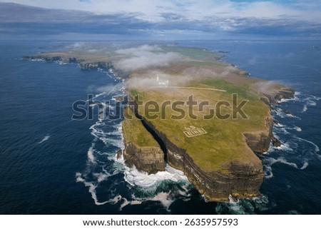 Still image of an aerial view of the Loop Head Lighthouse in County Clare in western Ireland