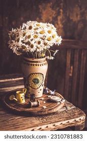 Still life with a bouquet of daisies - Shutterstock ID 2310781883