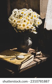 Still life with a bouquet of daisies - Shutterstock ID 2310781887