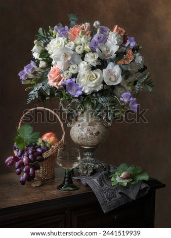 Still life with bouquet of flowers and fruit vase
