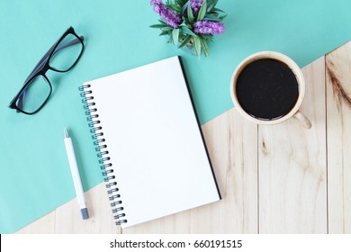 Still life, business, office supplies or education concept : Top view image of open notebook with blank pages and coffee cup on wooden background, ready for adding or mock up - Shutterstock ID 660191515