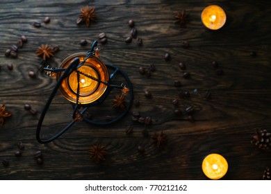 Still Life Candle Holder Light On Wood Plate With Pine Cones