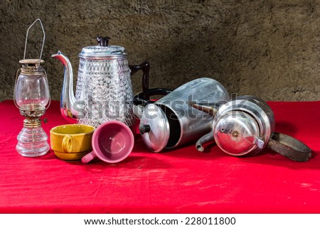 still life classic kettle with cup and lamp