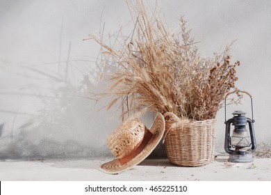 Still Life Country With Lantern And Wicker Basket. Boho Chic Style Decorations