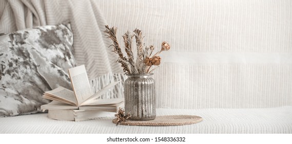 Still life decor details in the living room, a beautiful vase with dried flowers . The concept of comfort and home decor. - Powered by Shutterstock