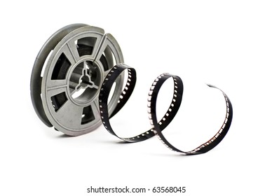 Still Life Of Dirty, Old 8mm Cine Film And Reel; Isolated On White Ground