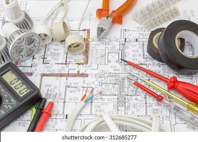 Still Life Of Electrical Components Arranged On Plans