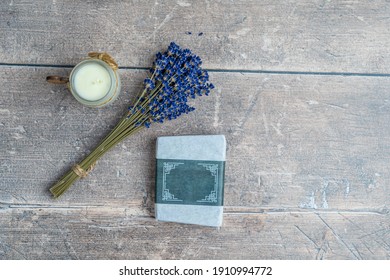 Still Life Flatlay Rustic Aromatherapy Display Of Lavender Bunch, Soap Bar And Small Artisan Candle Life Style