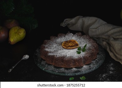 Still Life Food Photography. Dark Mood. Chocolate Cake And Fruits