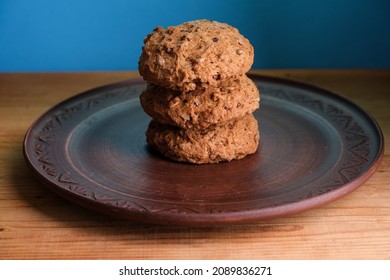 Still Life With Gingerbread Cookies In A Clay Plate. The Oat Cakes Are Stacked One By One.
