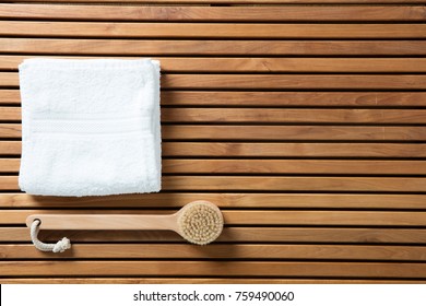 Still Life For Healthy Dry Brushing, Hygiene, Bath, Exfoliation Or Traditional Body Care Concept With Body Brush And Pure White Towel Over Beautiful Wooden Board, Copy Space Wallpaper, Top View