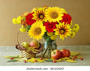 Still Life With Huge Bunch Of Autumn Flowers, Sunflowers And Red Roses, Apples And  Berries