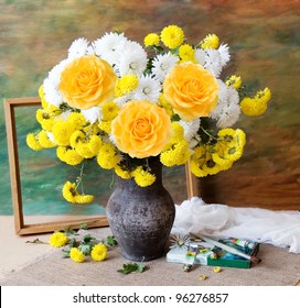 Still Life With Huge Bunch Of Autumn Flowers And Roses, Paints Collection And Wooden Frame On Painting Background