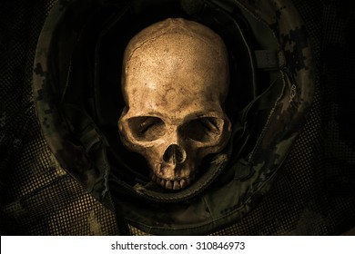 Still Life With Human Skull In Soldier Helmet