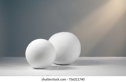 A still life photography of twin circles with flashlight are work of art depicting mostly inanimate subject matter, typically commonplace objects by man-made. - Shutterstock ID 756311740