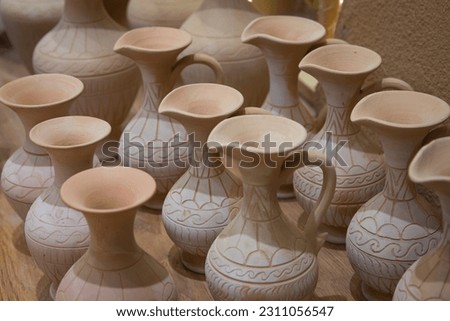 Still life photos of a group of earthenware jars