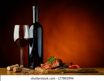 Still Life With Romantic Dinner With Gourmet Grilled Steak And Red Wine