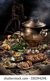 Still Life With Samovar, Fruits, Tea And Spinning Wheel