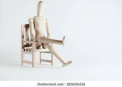 Still Life With Seated Wooden Mannequin