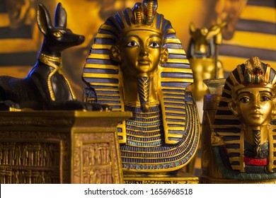 Still life of statues of king pharaoh tutankhamun tutankhamen and mythology jackal anubis inpu anup