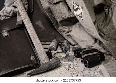Still life with tools of a field geologist - field vintage geology concept - Shutterstock ID 2183737953