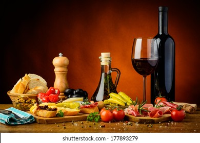 Still Life With Traditional Spanish Tapas And Red Wine