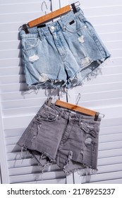 Still Life, Two Denim Shorts, Gray And Blue, Hang On Hangers On The Wall