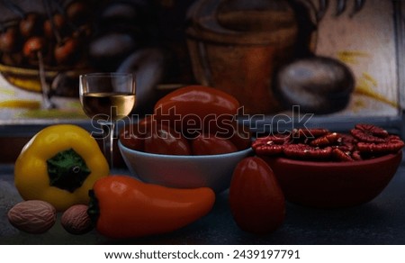 Still life with vegetables, nuts and oliveoil