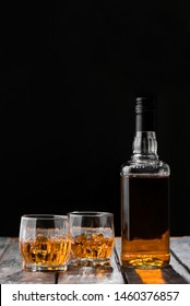 Still Life. Whiskey In To Glass. Wooden Table