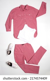 Still Life Of Women's Clothing: Pantsuit And White Top, Shoes Top View Layout