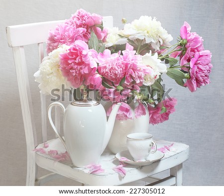 Similar – Woman decorated large bouquet of flowers with roses in vase