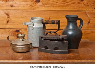 Still-life with old things on brown wooden background
