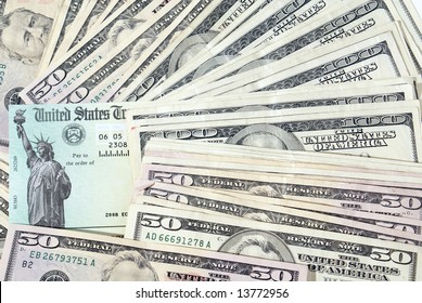 Stimulus Economic Tax Return Check And USA Currency