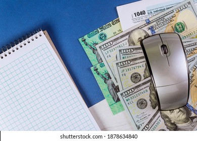 Stimulus Economic Tax Return Check 1040 U.S. Individual Income Tax Return With Us Money And Spiral Notepad,