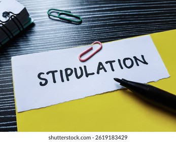 Stipulation writting on table background.