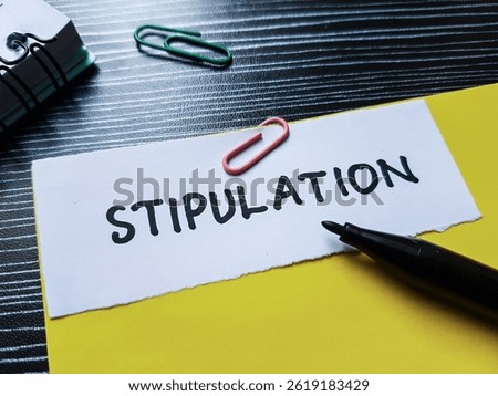 Stipulation writting on table background.