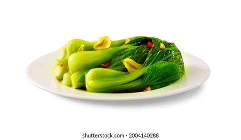 Stir Fried Bok Choy With Soy Sauce On Plate And Chopsticks On White Background, Asian Vegan Food, Side View