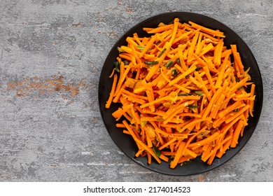 Stir Fried Carrot Sticks With Ginger And Scallions. Homemade Vegan Food. Top View.