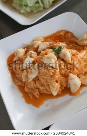 Stir Fried crab meat with curry powder. ฆeafood cuisine and food travel. Thai food thai cuisine food on dish, Copy space.