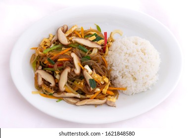 Stir Fried Korean Glass Noodle With Soy Sauce Called Japchae And Rice