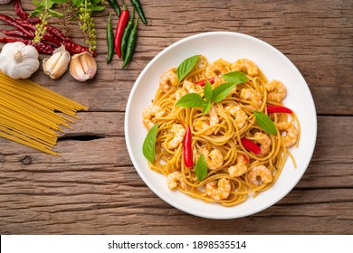 stir fried spicy spaghetti with shrimp and basil,Pad Kra Pao kung.Top view