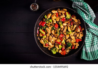 Stir Fry With Chicken, Mushrooms, Broccoli And Peppers. Chinese Food. Top View, Overhead