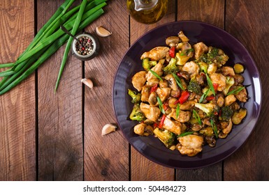 Stir Fry With Chicken, Mushrooms, Broccoli And Peppers - Chinese Food. Top View