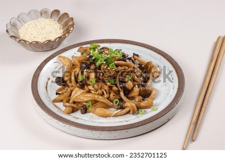 Stir Fry or Sauteed Shimeji Mushrooms also know as white beech or white clamshell mushrooms with Teriyaki Sauce.