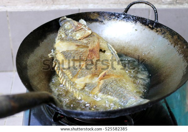 Stir Frying Tilapia Fish Frying Pan Stock Photo Edit Now 525582385