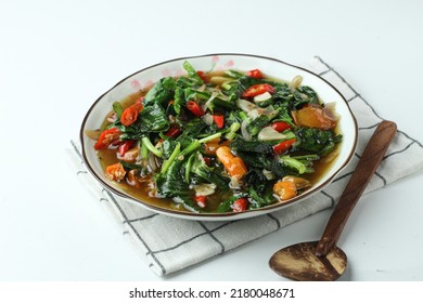 Stir-fried Mustard Greens Is A Traditional Indonesian Dish, Served On A Plate,soft Focus And Shinny Texture